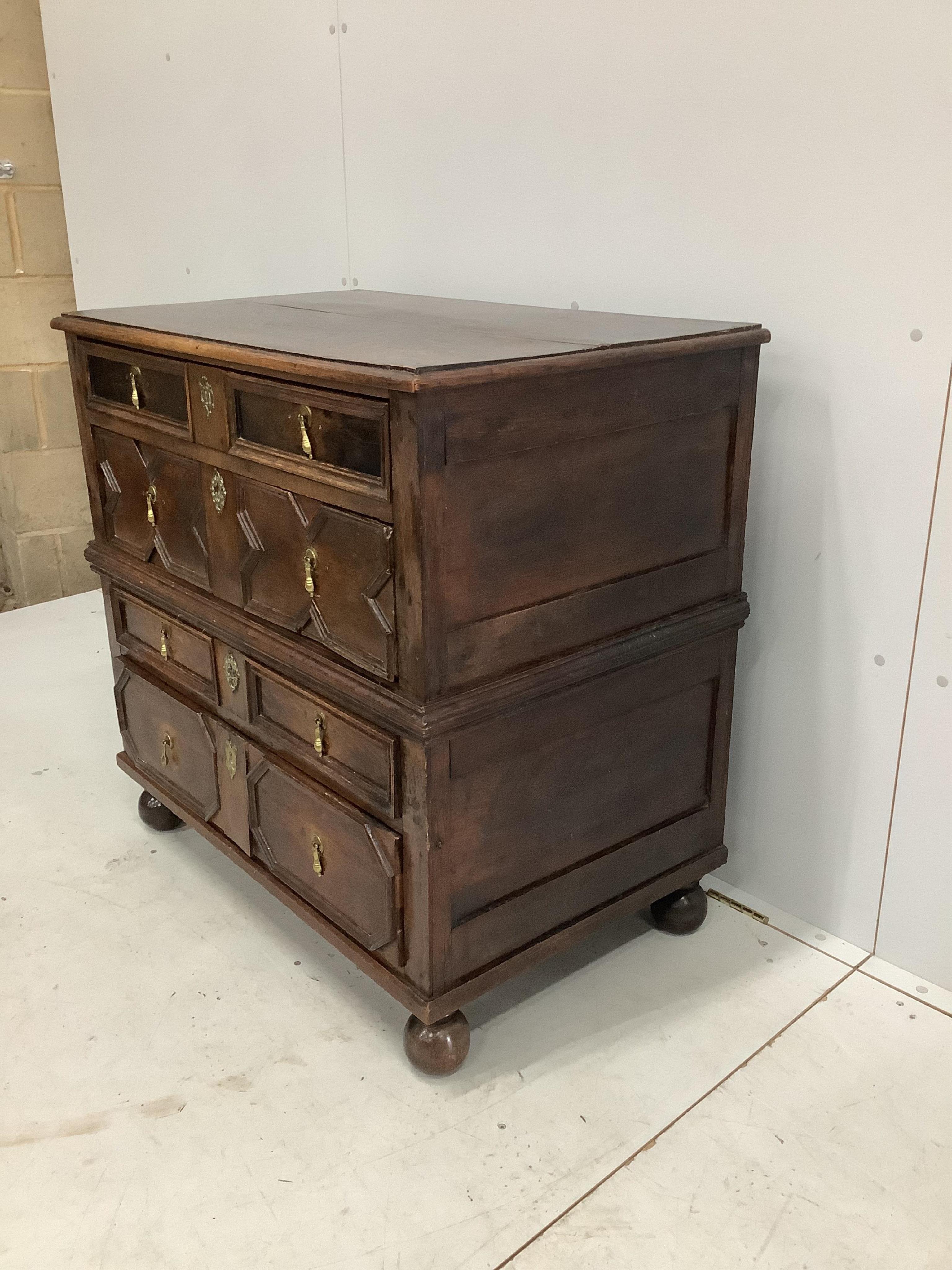 An early 18th century oak chest, width 92cm, depth 56cm, height 90cm. Condition - fair